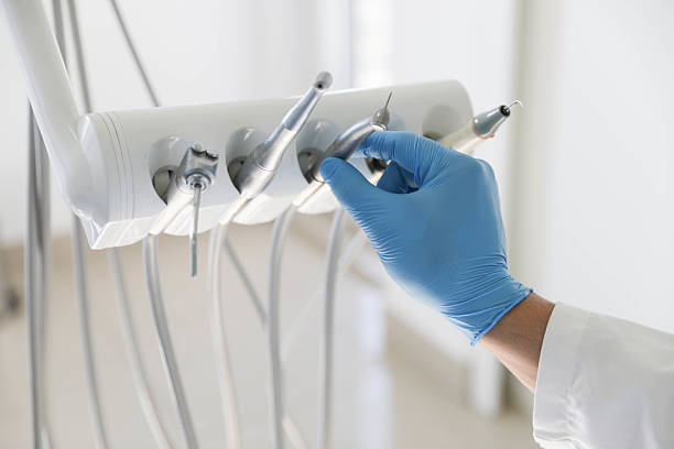 Professional Root Canal Treatment technician working in Aurora, TX